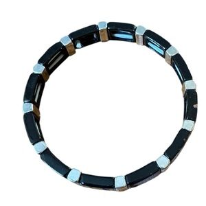 Roxanne Assoulin black enamel and silver stretch bracelet. GUC
